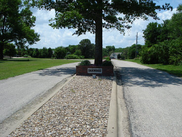 Oakwood North Entrance Sign and Pin Oak Tree